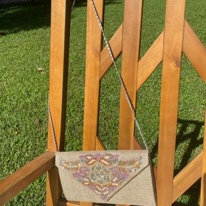 Sling bag with chain